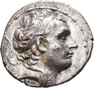 SELEUKID KINGS of SYRIA. Antiochos III Megas (222-187 BC). AR tetradrachm (16,48 g). Struck in Antioch circa 197-187 BC. Diademed head of Antiochos III to right / ??S???OS ANTIOXOY, Apollo seated left on omphalos, holding arrow in right hand and grounded bow in left hand; corcnuopia in outer left field. Light porosity on the surfaces. Lightly toned.