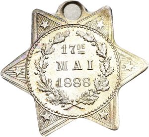 1888. Stjerneformet med Drammens byvåpen. Sølv. RR.1888. Stjerneformet med Drammens byvåpen. Sølv. RR.