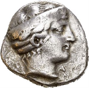 ELIS, Olympia. 376 BC (101 Olympiad). AR stater (11,68 g). F-A. Head of Hera right, wearing stephane / Eagle with spread wings standing right, head to left, all within olive wreath. Lusterous and lightly toned.