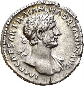 Hadrian. AD 117-138. AR denarius, Roma, AD 118, (3,74 g). Laureate and draped bust of Hadrian right / P M TR P COS II, SALVS AVG in exergue, Salus seated left, holding patera and feeding snake arising from altar. A few almost invisible scratches. Nicely toned with some iridescence.