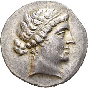 AEOLIS, Kyme. Circa 155-143 BC. AR tetradrachm (16,75 g). Metrophanes, magistrate. Head of Amazon Kyme to right, wearing tainia / KYMAION ?????F???S, horse standing right and raising foreleg; one-handled cup below raised foreleg. All within wreath. Wonderfully preserved surfaces. Lightly toned with faint golden highlights around devices. Almost as struck.