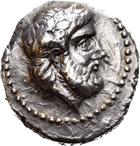 KINGS of PAEONIA, Lykkeios, (circa 358/356-335 BC). AR tetradrachm (12,45 g). Struck in Damastion or Astibos. Laureate head of Zeus to right / ????????, Herakles holding around neck of lion and beating it with club; bow and bowcase to right. Struck in high relief on the usual tight flan. Beautiful dark grey toning with luster.