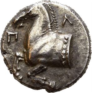 THRACE, Maroneia. Circa 398-385 BC. AR tribol (2.88 g). Struck under the magistrate Pel... ?-?, Forepart of horse to left / MA, Grape bunch on vine; rhyton in lower left field; all within dotted linear square in shallow incuse square. Obverse struck a little off centre and small areas of flat strike on reverse. Attractively toned.