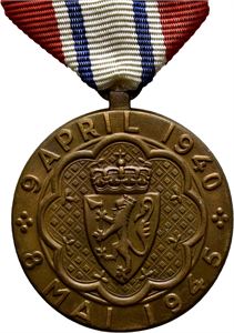 Haakon VII. Deltagermedaljen 1945 utgaven uten rosett. Bronse med bånd
