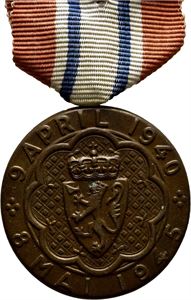 Haakon VII. Deltagermedaljen 1945 utgaven med rosett. Bronse med bånd