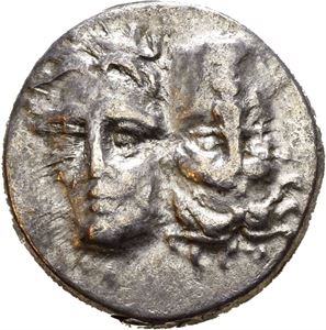 MOESIA, Istros. Circa 256-240 BC. AR drachm (5,71 g). Facing male heads, left or right, head inverted / ISTPIH, Eagle standing left, clutching dolphin; Greek letter A below. Obverse struck with worn dies. Toned.