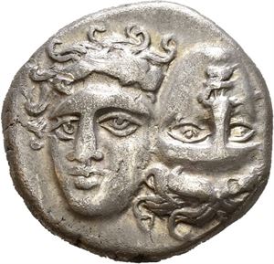 MOESIA, Istros. Circa 340-313 BC. AR drachm (5,67 g). Facing male heads, left or right, head inverted / ISTPIH, Eagle standing left, clutching dolphin; greek letter ? to right; Magistrate name (monogram) below. Minor scuff on obverse and a tiny scratch on the reverse. Toned.