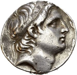 SELEUKID KINGS of SYRIA, Demetrios I Soter. 162-150 BC. AR tetradrachm (16,43 g). Antioch mint, dated S.E. 158 = 155/4 BC. Diademed head of Demetrios right, within wreath / ??S???OS ????????? SO????S, Tyche seated left on throne with tritoness support, holding cornucopia and short sceptre; monogram in outer left field; HNP (date) in exergue. Attractive large portrait. Lightly toned.