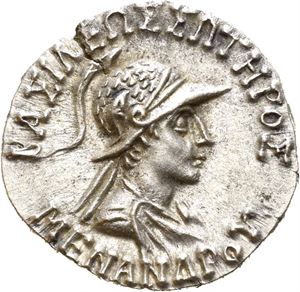 BAKTRIA, Indo-Greek Kingdom. Menander I (circa 165/55-130 BC). AR drachm (2,46 g). Diademed and draped bust of Meneader to left, wearing Boiotian helmet / Athena Alkidemos advancing left, brandishing thunderbolt and shield decorated with aegis; monogram to left. Flan crack. Good metal quality. Lightly toned.