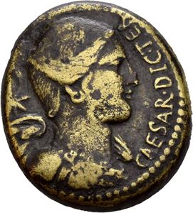 Julius Caesar. Assassinated 44 BC. AE dupondius, Roma 46-45 BC, (13,67 g). Issued under the prefect C. Clovius. CAESAR·DIC·TER, Draped and winged bust of Victory right, star to left / C·CLOVI PRAEF, Minerva advancing to left, holding trophy over shoulder and spears and shield decorated with Medusa; snake at feet gliding left with head erected. Minor smoothing and small cleaning scratches. Brown and brassy surfaces.