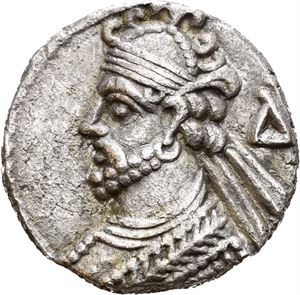 KINGS of PARTHIA. Vologases III (circa AD 105-147). BI tetradrachm (8,92 g). Seleukeia on the Tigris mint. Dated SE 435 (= AD 123/4). Diademed and draped bust of Volugases to left, wearing tiara; ? behind / King seated left on throne, receiving wreath from Tyche; E?Y (year) above, month in exergue. Lightly toned.