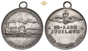 Drammen-Randsfjord jernbane 25-års jubileum 1891. Throndsen. Forsølvet bronse med hempe