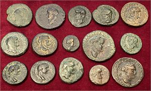 # 25. Lot of 15 Roman Provincial bronze coins struck during the reign of Vespasian.