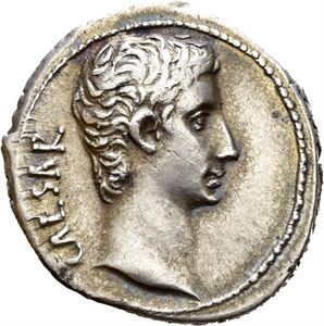 Augustus. 27 BC-AD 14. AR denarius, Pergamon mint 27 BC, (3,73 g). CAESAR, Bare head of Augustus right / AVGVSTVS, Bull standing right. Minor die shift on reverse and a few faint hairlines. Well struck without the usual flan crack. Wonderful portrait and bull. Attractive light iridescent toning.