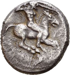 SICILY, Gela. Circa 490-480 BC. AR didrachm (8,59 g). Cavalryman charging right on horseback, brandishing spear / Forepart of bearded man-faced bull (river God) to right. Obverse struck with worn die and a little off centre. Wonderful iridescent toning.