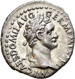 Domitian. AD 81-96. AR quinarius, Roma AD 88, (1,60 g). Laureate head right / IMP XIIII COS XIIII CENS P P P, Victory seated left, holding wreath and palm branch. Well struck and nicely toned.