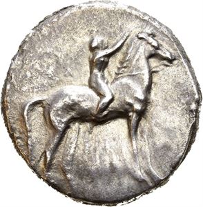 CALABRIA, Taras. Circa 302-280 BC. AR didrachm (7,80 g). Youth on horse standing right, crowning horse / T???S /AGA, Taras astride dolphin, riding left and holding bunch of grapes. Well centered for the type. Toned.