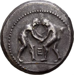 PAMPHYLIA, Aspendos. Circa 330-250 BC. AR stater (10,41 g). Two nude wrestlers grappling with each other, E between / ESTFE?IY, slinger standing right, O between legs; triskeles and club in right field. Obverse struck with worn die. Reverse struck with slightly worn die. Minor die shift on obverse. Small deposits on reverse. Nice cabinet toning.
