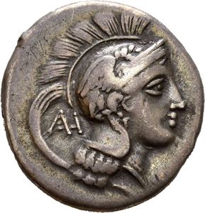 LUCANIA, Velia. Circa 300-280 BC. AR nomos, (7,33 g). Philistion group. Helmeted head of Athena left; monogram behind neck; F before neck (not visible) / YE?HTON, Lion standing right; above, horizontal grain ear between F and I; ? below. A few tiny marks on obverse. Attractive deep old cabinet toning.