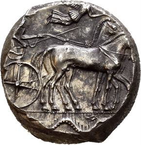 SICILY, Syracuse. 450-440 BC. AR tetradrachm (17,38 g). Struck under the Second Democracy. Slow quadriga advancing right; Nike flying above, crowning horses; sea monster in exergue / &Sigma;VR&Alpha;&Kappa;&Omicron;&Sigma;&Iota;&Omicron;&Nu;, Head of Arethousa right, wearing diadem; four dolphins around swimming clockwise. Well preserved exemplar of this rare type. Wonderful cabinet tone with some darker areas on the obverse. A fantastic coin in hand.