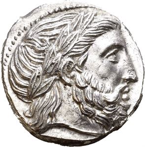 KINGS of MACEDON, Philip III Arrhidaios, 323-317 BC. AR tetradrachm (14.27 g). In the name and types of Philip II. Amphipolis mint. Struck under Polyperchon, circa 318-317 BC. Laureate head of Zeus right / FI?I?-?OY, Nude youth on horseback right, holding palm branch; monogram below, ? below raised foreleg. Tiny scuff on obverse and area of minor porosity on reverse. Struck from fresh dies. Bright and lustrous.