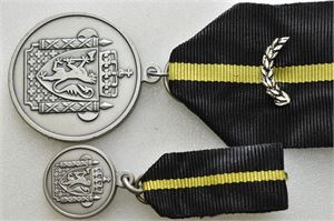 Politimedaljen med laurbærgren. Med miniatyr
