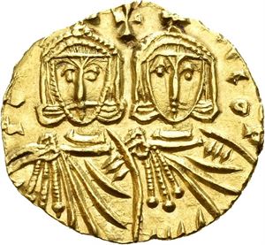Constantine V, Copronymus 741-775, AV solidus, Constantinople (3,82 g). Facing busts of Constantin V, with short beard (on left) and his son Leo IV, beardless (on right), each wearing crown and chlamys, in field above cross/Facing bust of Leo III, with short beard, wearing crown and loros, and holding cross potent. Clipped on the edge