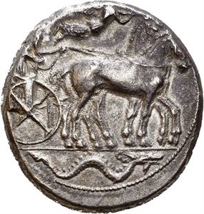 SICILY, Syracuse. 450-440 BC. AR tetradrachm (17,24 g). Struck under the Second Democracy. Slow quadriga advancing right; Nike flying above, crowning horses; sea monster in exergue / SVR???S???, Head of Arethousa right, wearing diadem; four dolphins around swimming clockwise. Struck a little off-centre. Lightly toned with patches of iridescense.