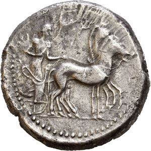 SICILY, Gela. Circa 480-470 BC. AR tetradrachm (15,59 g). Slow quadriga advancing right, horses crowned by Nike flying right, above / CE?AS, Forepart of bearded man-faced bull (river God) charging right. Archaic type. Obverse struck with worn die. Several old cleaning stratches in the fields. Well centered coin with patches of find patina.