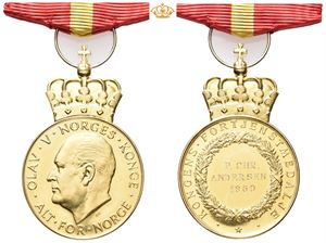 Olav V. Kongens fortjenstmedalje. Hansen. Gull. 28 mm med krone og bånd