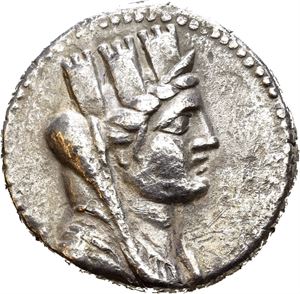 PHOENICIA, Arados. Dated year 194 (=66/65 BC). AR tetradrachm (14,60 g). Veiled and turreted bust of Tyche to right / APA?ION, Nike advancing left, holding aphlaston in her right hand and palm branch over her left shoulder; ?qP (date) above Aramaic H; ?S in lower left field. All within wreath. Minor roughness/corrosion in fields. Lightly toned.