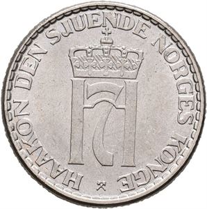 Haakon VII. 1 krone 1954. Et fåtall ørsmå kontaktmerker