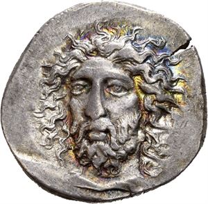 DYNASTS of LYCIA, Perikles. Circa 380-360 BC. AR stater (9.85 g). Struck circa 380-375 BC. Head of Perikles facing, turned slightly to left, drapery around neck / Perikle (in Lycian script), Nude warrior in crested Corinthian helmet standing right in fighting position, raising sword with right hand and holding shield with left hand; star in left field, triskeles to lower right. All within shallow incuse square. An impressive coin of fine classical style. Wonderful iridescent toning around devices. Small flan crack at 2 o&#39;clock. Overstruck on an uncertain type.