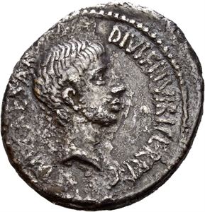 Octavian as Triumvir. AR denarius, Southern or central Italy 37 BC, (3,88 g). IMP•CAESAR DIVI•F•III•VIR•ITER•R•P•C, Bare and bearded head of Octavian right / COS•ITER•ET•TER•DESIG, Emblems of the augurate and pontificate: simpulum, aspergillum, guttus, and lituus. With thick encrustations of horn silver. Darkly toned.
