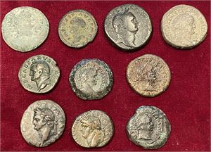 # 23. Lot of 10 Roman Provincial bronze coins from the Flavian dynasty.