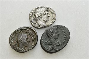 LOT #23. 3 Roman provincial AR tetradrachms. PHOENICIA, Ace-Ptolemais. Caracalla. AD 198-217 (9,47 g); SELEUCIS and PIERIA, Antioch. Elagabalus. AD 218-222 (13,31 g); SELEUCIS and PIERIA, Antioch. Philip I. AD 244-249 (14,01 g). Three coins in lot.
