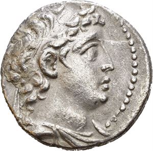 SELEUKID KINGS of SYRIA. Demetrios II Nikator (second reign, 129-125 BC). AR tetradrachm (13,26 g). Tyre mint. Dated SE 184 (=129/8 BC). Diademed head of Demetrios II to right / BASI?EOS ?HMHTPIOY, Eagle standing left, palm branch over shoulder; club in left field; monograms in left and right field and between eagle's legs. ??? (date) in right field. Numerous very light cleaning scratches. Corrosion on the surfaces. Lightly toned.