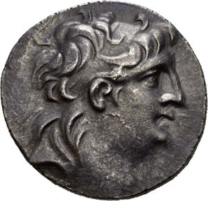 SELEUKID KINGS of SYRIA. Antiochos VII Sidetes (138-129 BC). AR tetradrachm (16,40 g). Cappadocian imitations in the name of Antiochos VII, struck circa 130-80 BC. Diademed head of Antiochos VII to right / BASI?EOS ANTIOXOY EYEPGETOY, Athena standing left, holding Nike in right hand and grounded shield in left hand, spear behind; monogram above A in left field. All within laurel wreath. Obverse struck with slightly worn die. Area of weak strike on reverse. A few hairlines under tone. Dark grey, even toning.