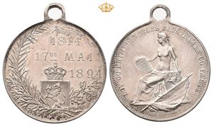 1894. Kvinne med grunnloven. Sølv