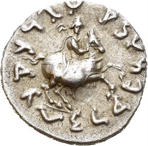 BAKTRIA, Greco-Baktrian Kingdom. Antimachos II Nikephoros (circa 160-155 BC). Uncertain mint, Indian standard. AR drachm (2,33 g). BASI?EOS NIKHTOPOY ?NTIMAXOY, Nike advancing left, holding wreath and palm branch; monogram to left / 'Maharajasa jayadharasa Amtimakhasa' (in Karoshti), Antimachos II on horseback advancing right, wearing helmet. Light porosity. Lightly toned.