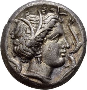 SICILY, Punic issues. Lilybaion? 330-305 BC. AR tetradrachm (16,72 g). Head of Arethousa right, wreathed with reeds; three dolphins around / Raš Melqart (in Punic). Fast quadriga advancing left; driver crowned by Nike flying right, above. Struck on a compact flan. Toned.