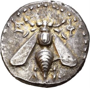 IONIA, Ephesos. Circa 202-150 BC. AR drachm (4,08 g). Charminos, magistrate. EF, Bee with straight wings / XAPMINOS, Stag standing to right, palm tree in background. Nice iridescent toning. Small patches of horn silver.