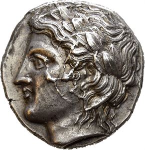 MACEDON, Chalkidian League. Circa 365 BC. AR tetradrachm (14,43 g). Olynthos Mint. Laureate head of Apollo left / XA&Lambda;KI&Delta;E&Omega;N around kithara; small letters in fields; T above and to lower left, E to lower right; all within incuse square. Struck with worn obverse die; traces of die rust on the reverse. Nicely toned.