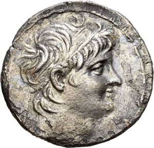 SELEUKID KINGS of SYRIA. Alexander II Zabinas (128-122 BC). AR tetradrachm (15,82 g). Damaskos mint. Dated SE 188 (=125/4 BC). Diademed head of Alexander II to right / BASI?EOS A?E?AN?POY, Zeus seated on to throne left, holding Nike in right hand and resting on scepter with left hand; monogram in outer left field and below throne; H?P (date) in exergue. Some corrosion and horn silver on the surfaces. Several light cleaning scratches. Iridescent toning.