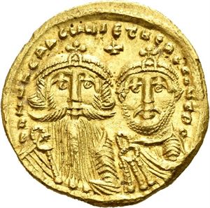 Heraclius 610-641, AV solidus, Constantinople (4,48 g). Facing busts of Heraclius (on l.) with long beard and Heraclius Constantine (on r.), each weears chlamys and crown/Cross potent on three steps
