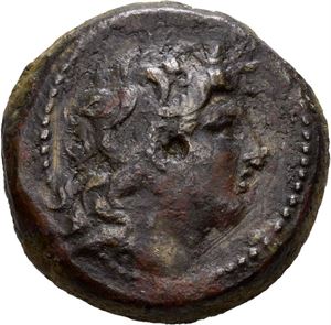 SELEUKID KINGS of SYRIA. Tryphon (usurpator, 142-138/7 BC). Æ18 (5,79 g). Antioch on the Orontes mint. Diademed head of Tryphon to right / BASI?EOS TPYFO?S, Spiked Macedonian helmet adorned with wild goat horns; aplustre to inner left. Brown patina with red cuprite patches. A few cleaning scratches.