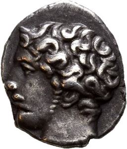 GAUL, Messalia. After 400 BC. AR obol (0,73 g). Head of young Apollo to right, with sideburns / Wheel with four spokes; M - A within two of the four sections. Wonderful dark cabinet toning.