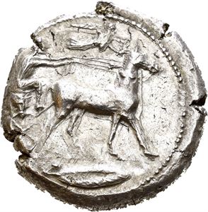 SICILIA, Messana. Circa 438-434 BC. AR tetradrachm, (17,21 g). Seated muleteer driving mule biga left, Nike flying above and crowning mule; laurel leaf in exergue. ME&Sigma;&Sigma;A-N-ION, hare springing right. Struck with worn dies and obverse struck a little off centre. Double struck on obverse. A few die cracks. Lightly toned. A rarer type with few recorded specimens from the past 20 years of online auction records. Same dies as the one sold at Nomos, obolos 6, lot 166.