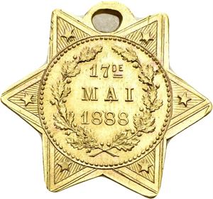 1888. Stjerneformet. Forgylt bronse