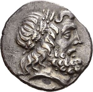 THESSALY, Thessalian league. Mid-first century BC. AR stater (6,14 g). Petraios and Ptolemaios, magistrates. Head of Zeus, wreathed with oak leaves / T?SS??O?, ???????V above, ?????????S in exergue. Athena Itonia advancing right. Toned.